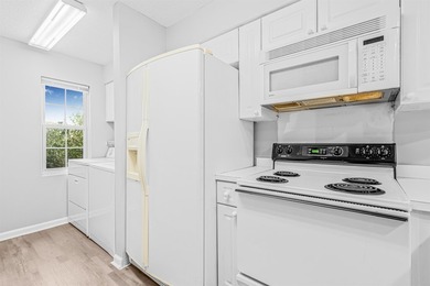 Welcome to this charming, updated 2-bedroom, 2-bathoom condo - photo 7