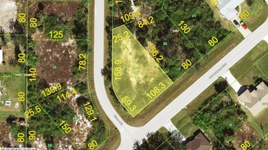 This beautiful, oversized corner lot with city water is in the - photo 1