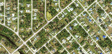 This beautiful, oversized corner lot with city water is in the - photo 3
