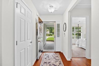 This 3 bed/2 bath charming coastal cottage is nestled within The - photo 3