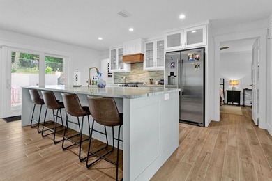 This home will take your breath away! From the high-end finishes - photo 13
