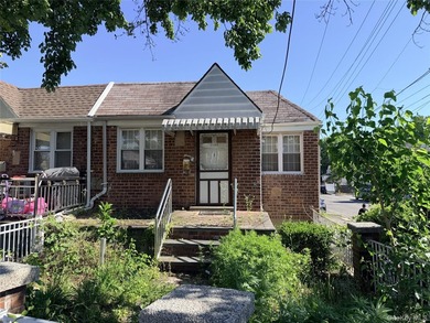 Opportunity in the Bronx. This 3 bedroom, 2 bath brick home sits - photo 2