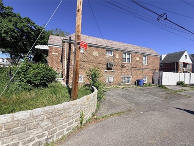 Opportunity in the Bronx. This 3 bedroom, 2 bath brick home sits - photo 3