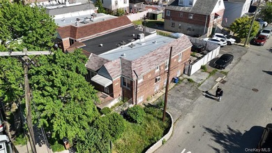 Opportunity in the Bronx. This 3 bedroom, 2 bath brick home sits - photo 9