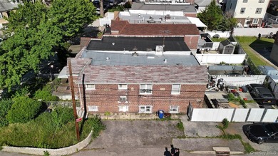 Opportunity in the Bronx. This 3 bedroom, 2 bath brick home sits - photo 10