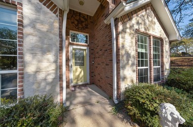This beautifully maintained 4-bedroom, 2-bath traditional brick - photo 2