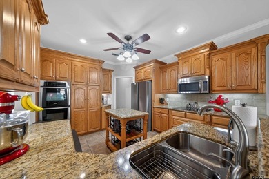 This beautifully maintained 4-bedroom, 2-bath traditional brick - photo 8