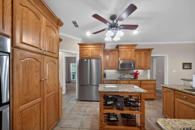 This beautifully maintained 4-bedroom, 2-bath traditional brick - photo 9