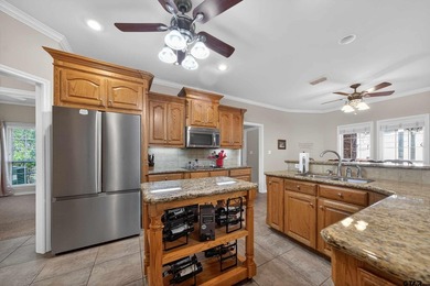 This beautifully maintained 4-bedroom, 2-bath traditional brick - photo 10