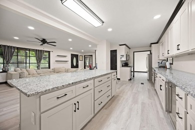 Welcome to this beautifully remodeled 4-bedroom, 1 full and 1 - photo 11