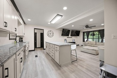 Welcome to this beautifully remodeled 4-bedroom, 1 full and 1 - photo 13