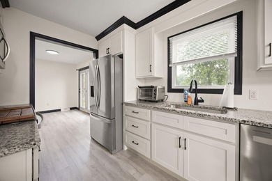 Welcome to this beautifully remodeled 4-bedroom, 1 full and 1 - photo 15
