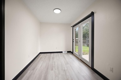 Welcome to this beautifully remodeled 4-bedroom, 1 full and 1 - photo 17