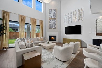 Experience modern luxury in this stunning Perry Home located in - photo 3