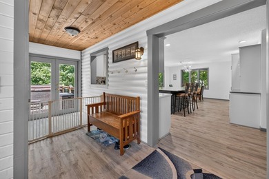 Nestled in the woods on 1.2 acres, this charming partial log - photo 17
