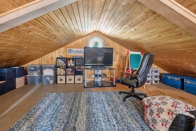 Nestled in the woods on 1.2 acres, this charming partial log - photo 25