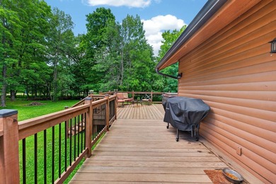 Nestled in the woods on 1.2 acres, this charming partial log - photo 30