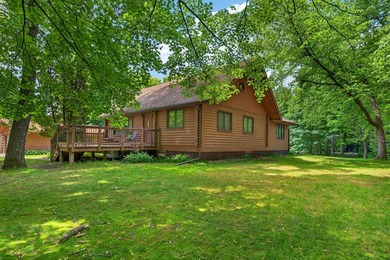 Nestled in the woods on 1.2 acres, this charming partial log - photo 32