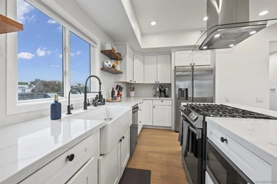 Beautifully renovated 3bed/3bath townhome located steps from the - photo 1