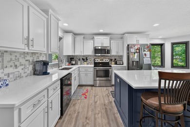Nestled in the woods on 1.2 acres, this charming partial log - photo 42