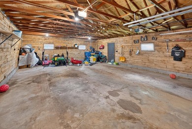 Nestled in the woods on 1.2 acres, this charming partial log - photo 46