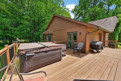 Nestled in the woods on 1.2 acres, this charming partial log - photo 48