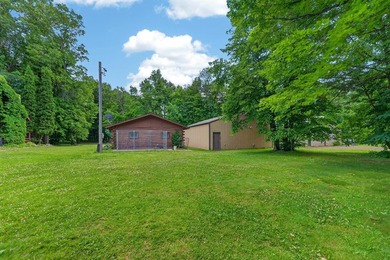 Nestled in the woods on 1.2 acres, this charming partial log - photo 49