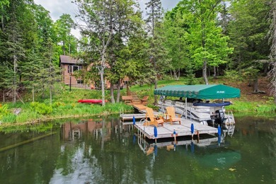 Tucked away in Watersmeet, MI, just north of the border, you'll - photo 4
