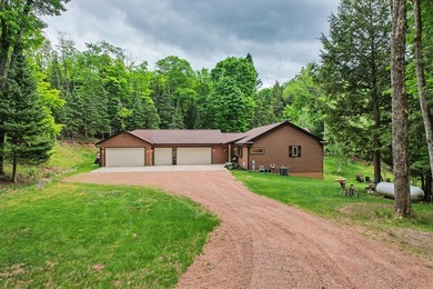 Tucked away in Watersmeet, MI, just north of the border, you'll - photo 5