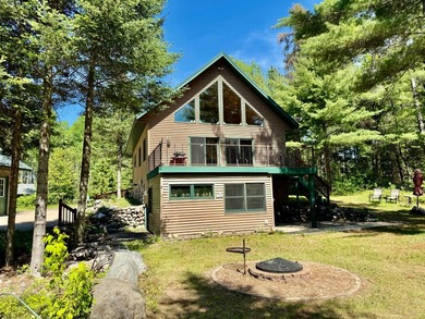 Discover this charming 2 bedroom, 2 bath chalet overlooking the - photo 3