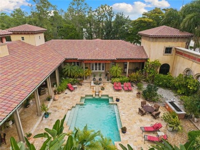 Set on a 1.63-acre corner lot in Quail West, this distinctive - photo 1