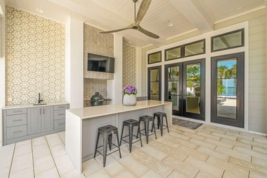 Privately positioned on over 1.03 bayfront acres in Miramar - photo 12
