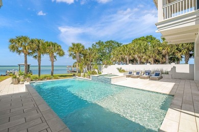 Privately positioned on over 1.03 bayfront acres in Miramar - photo 13