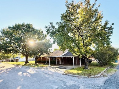 Lake Home For Sale in Collinsville, Texas