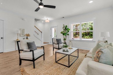 Located on a beautiful homesite of over a quarter acre in the - photo 4