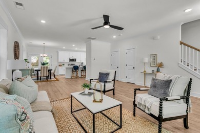Located on a beautiful homesite of over a quarter acre in the - photo 5