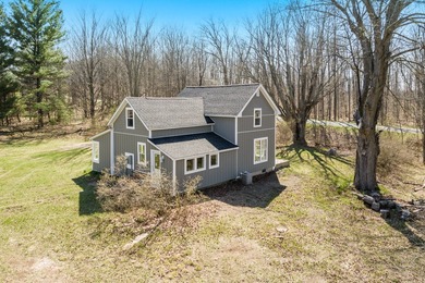 Charming farmhouse on nearly 1.6 acres in the heart of Manistee - photo 8