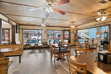 The CrossEyed Catfish on historic Main Street in Hardy is now - photo 25