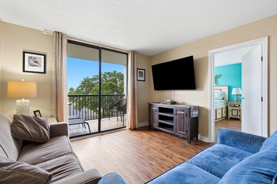 Welcome to Holiday Tower, where coastal convenience and a - photo 2
