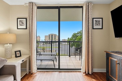 Welcome to Holiday Tower, where coastal convenience and a - photo 4