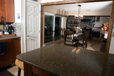 This charming three-bedroom, two-bathroom house offers a unique - photo 11