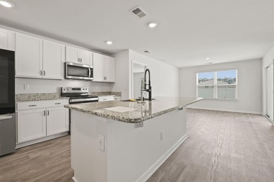 Welcome to 187 Seasons Trace Loop, a charming home located in - photo 6