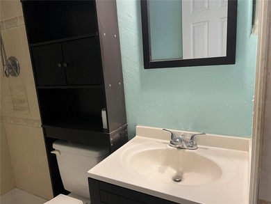 Welcome home to this charming 4-bedroom, 2-bath concrete block - photo 15