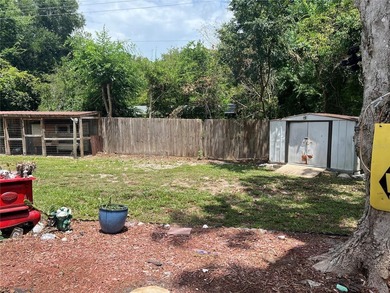 Welcome home to this charming 4-bedroom, 2-bath concrete block - photo 23