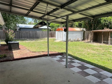 Welcome home to this charming 4-bedroom, 2-bath concrete block - photo 24