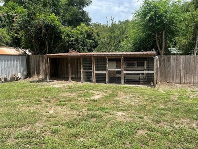 Welcome home to this charming 4-bedroom, 2-bath concrete block - photo 25