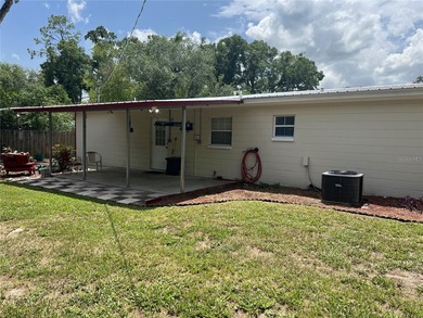 Welcome home to this charming 4-bedroom, 2-bath concrete block - photo 29