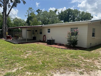 Welcome home to this charming 4-bedroom, 2-bath concrete block - photo 30