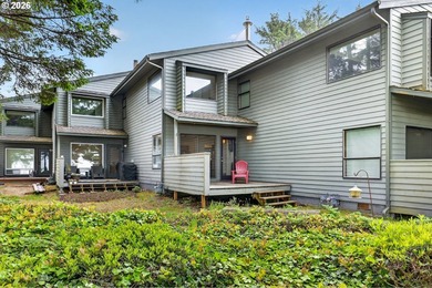 Large windows fill the living spaces with natural light while - photo 2