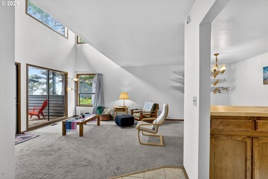 Large windows fill the living spaces with natural light while - photo 3